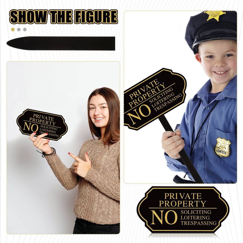 Black private property no trespassing yard sign held in hand on pointed stake