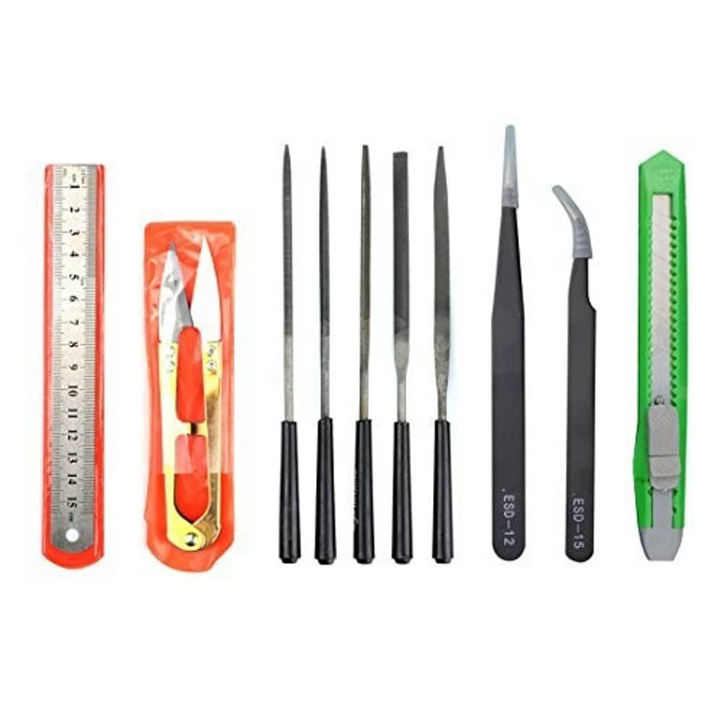 25-piece modeling tools set with carving blades, ruler, and green utility cutter