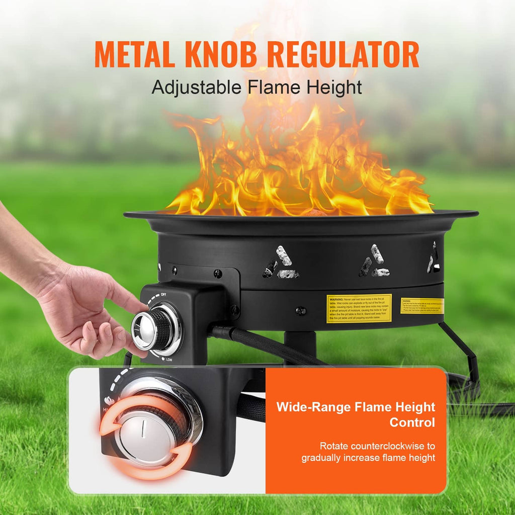Black propane fire pit with metal regulator knob beside burning flames