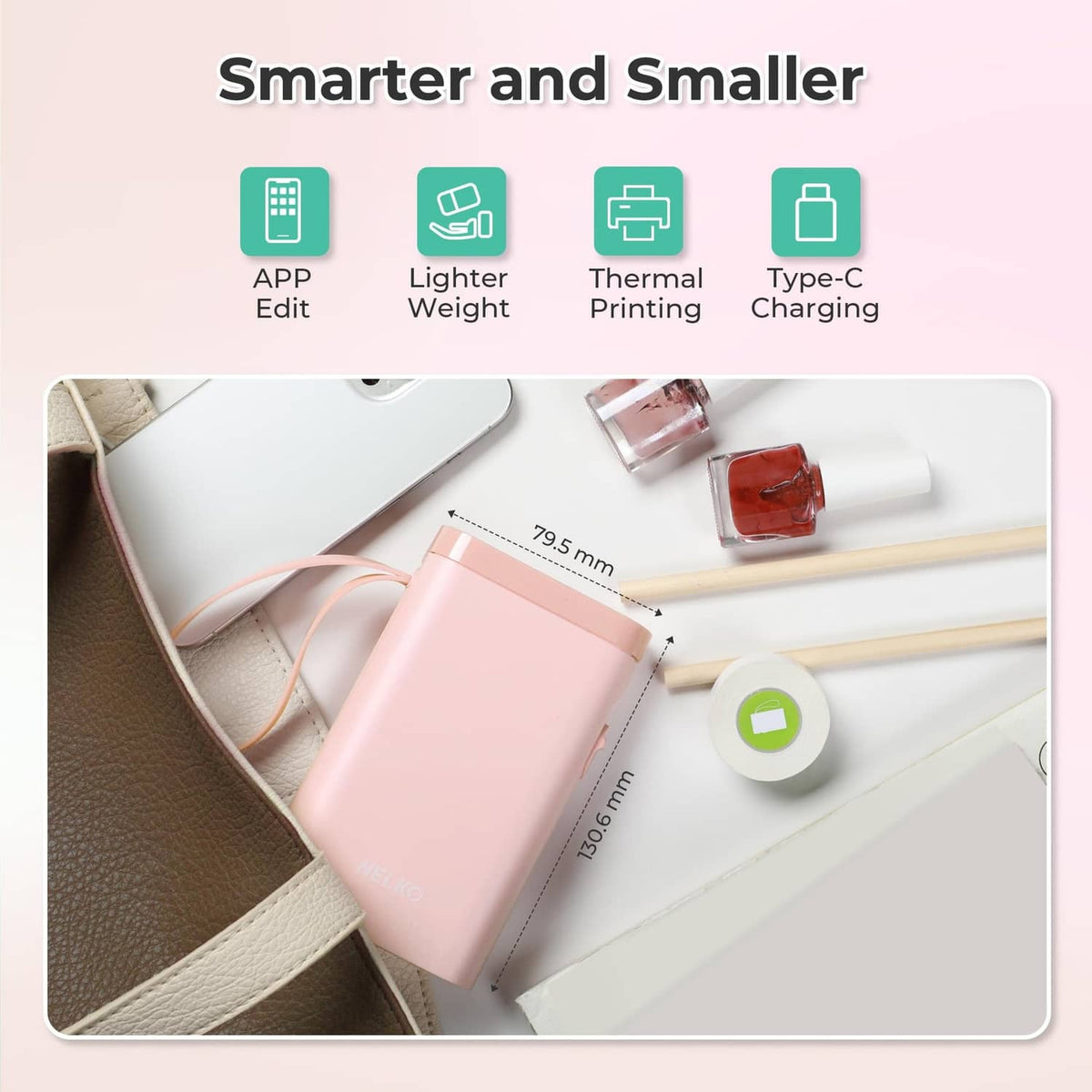 Pink handheld thermal label printer, compact design with charging cable