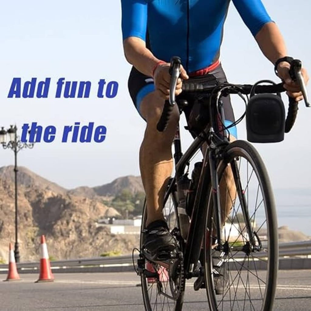Black silicone speaker cover attached to bicycle handlebars with strap