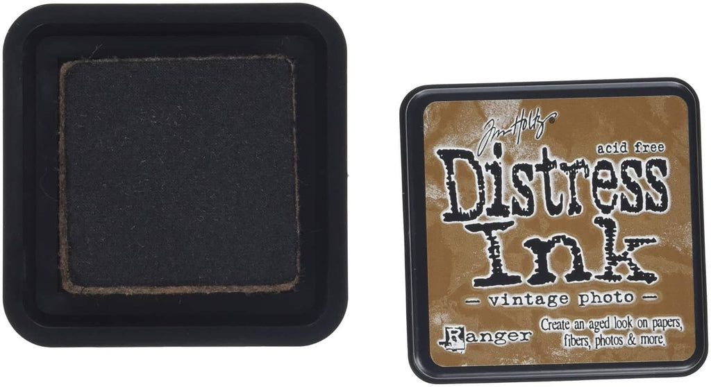 Ink pad with black base and hinged lid; Vintage Photo label on top