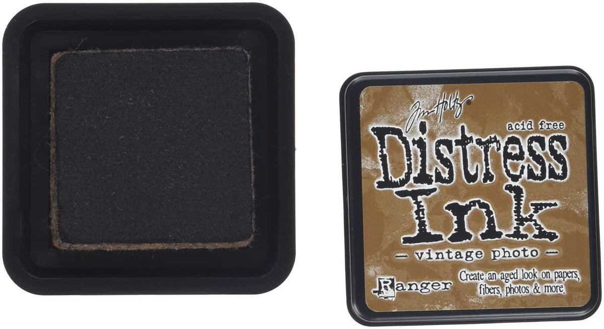 Ink pad with black base and hinged lid; Vintage Photo label on top