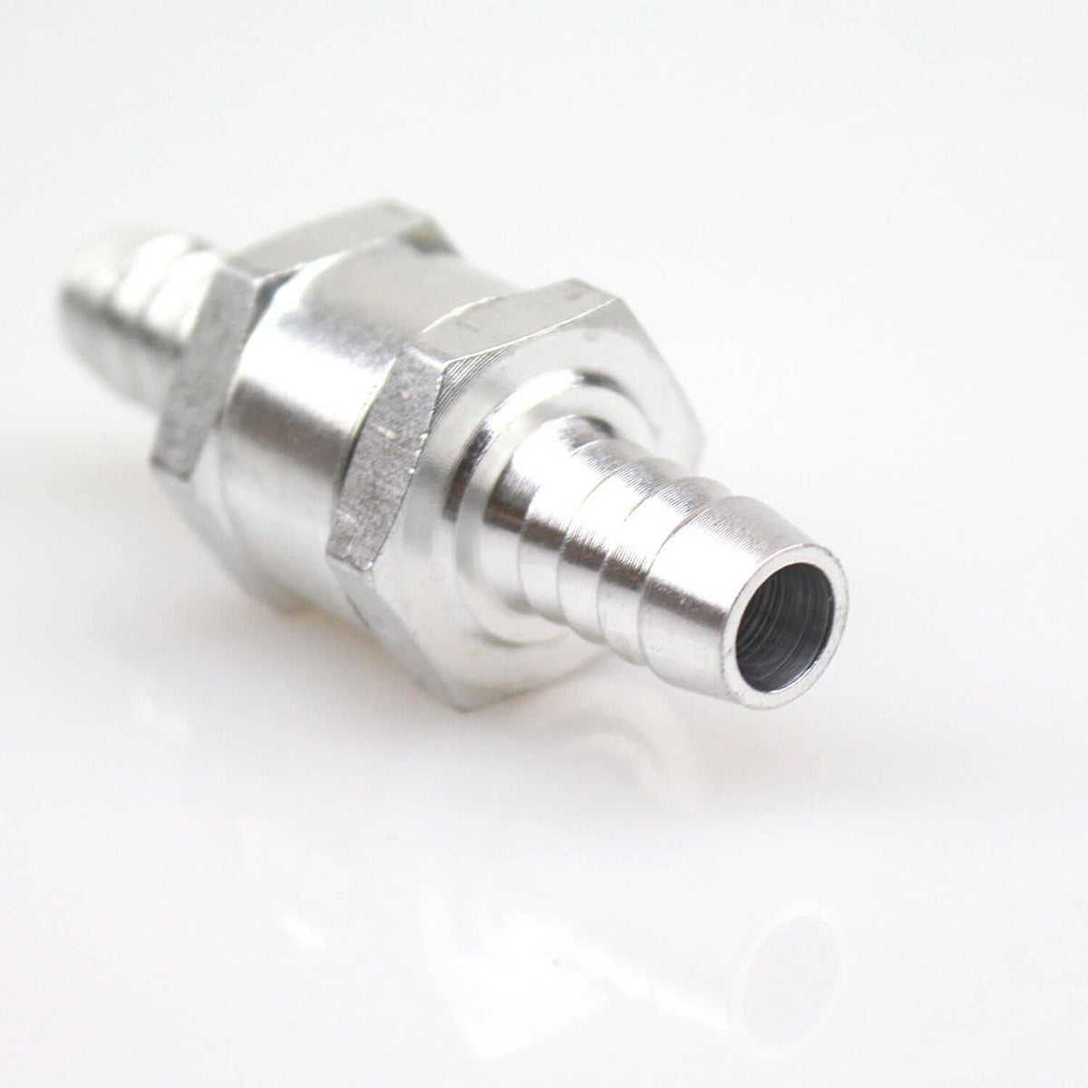 Close-up of 8mm fuel line check valve barbed connector and ridged metal body