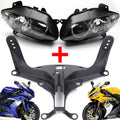 Black front headlight assembly with clear lenses and attached upper stay bracket