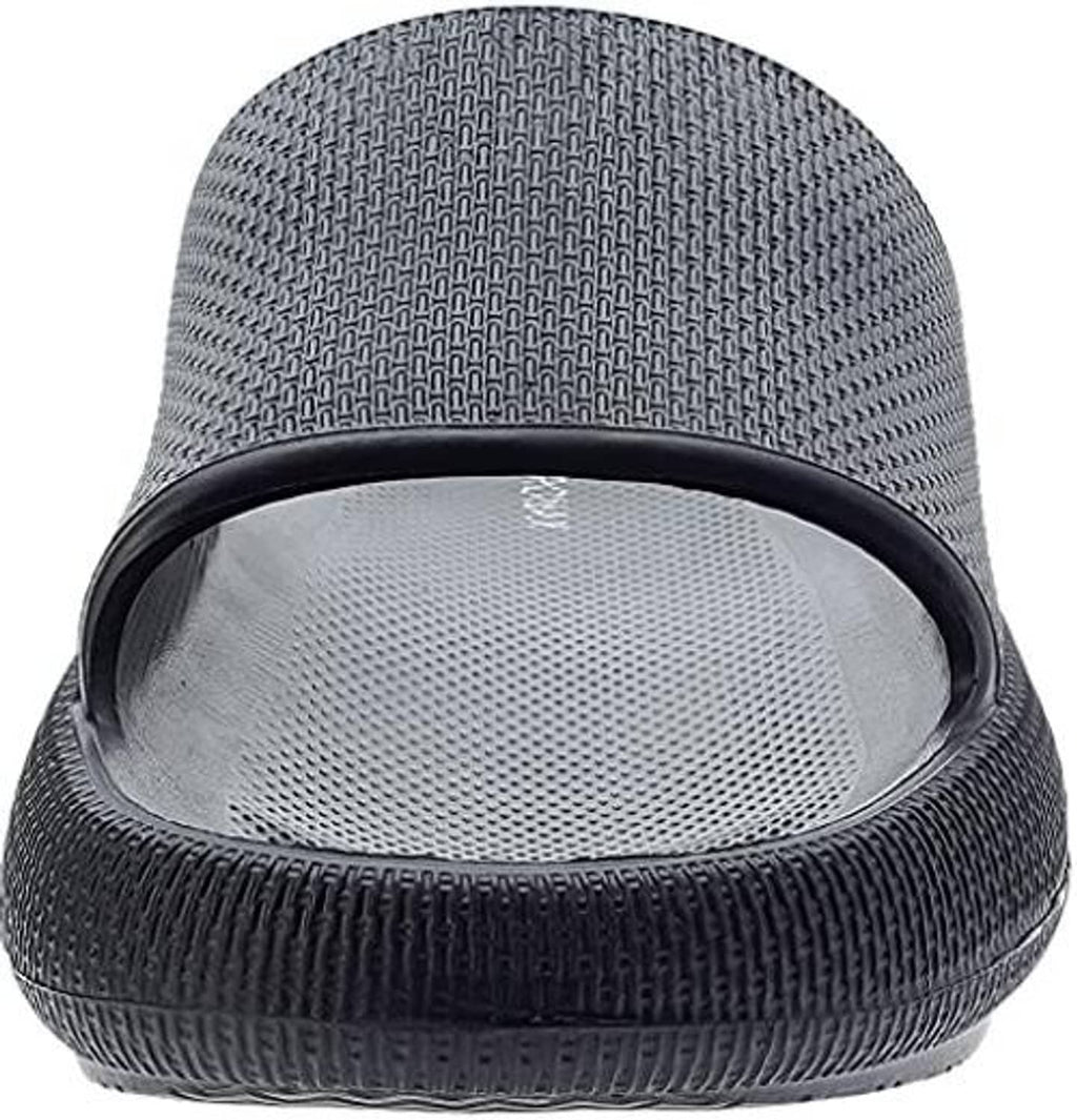Black pillow slippers with mesh-like interior footbed and thick cushioned base.