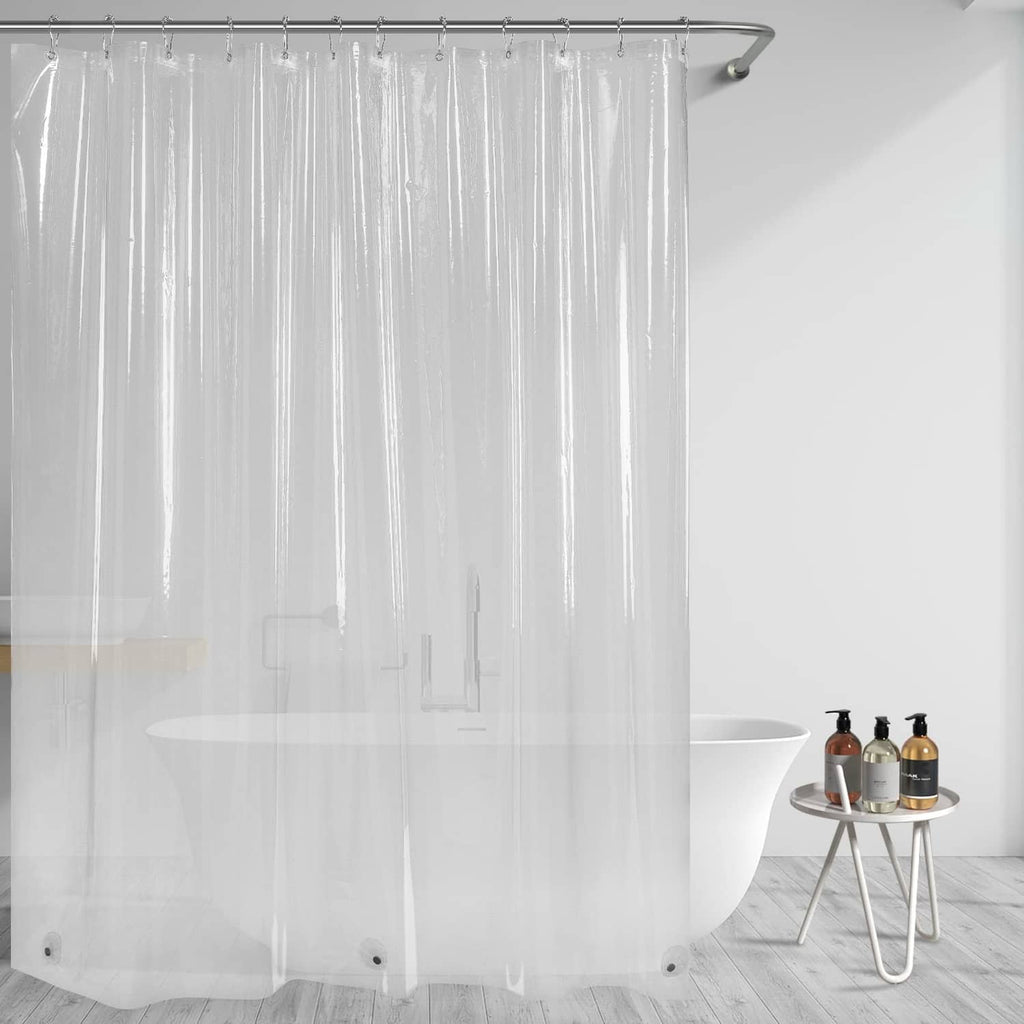 Clear shower curtain liner hanging in front of tub, see-through coverage