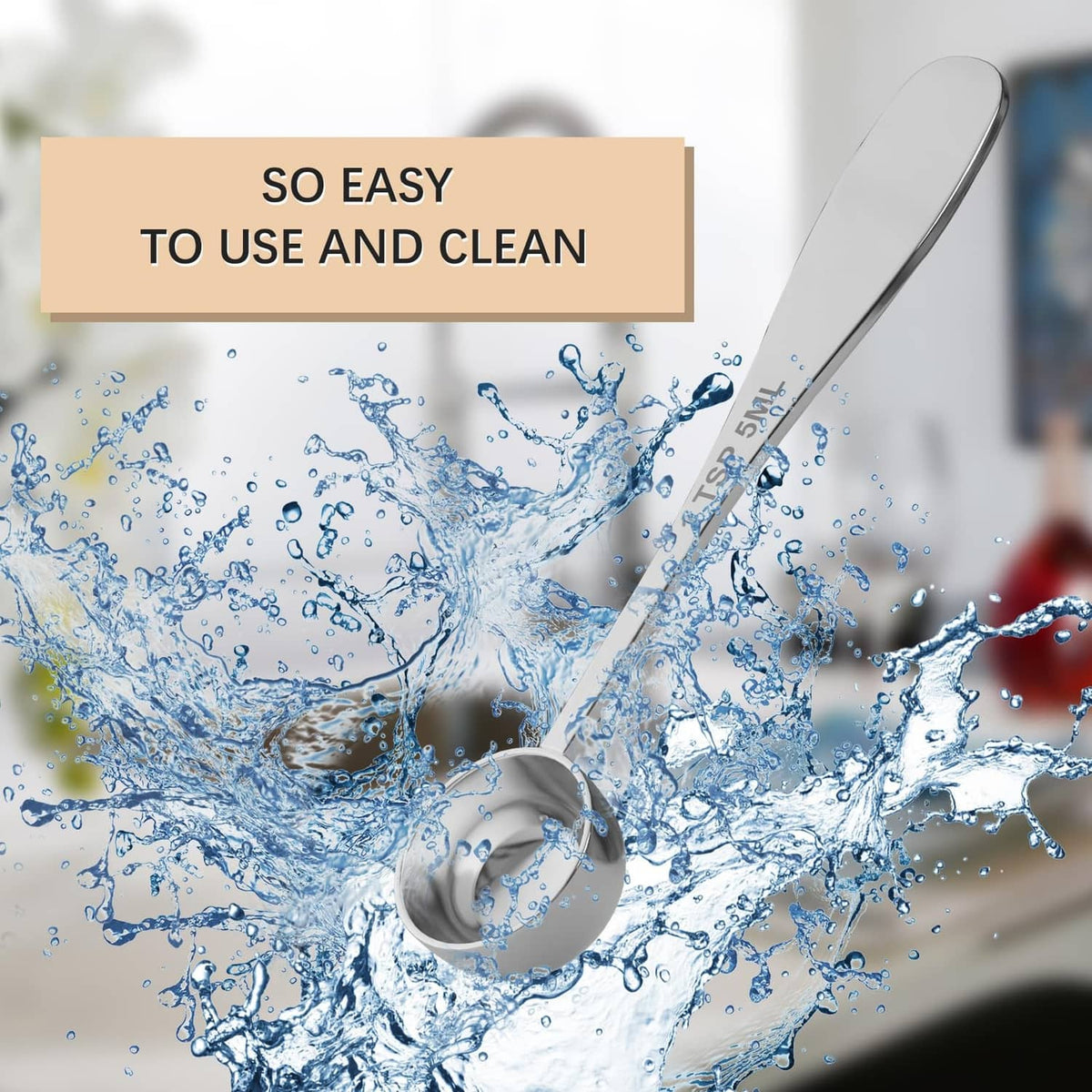 Stainless steel measuring spoon near water splash, designed for easy cleaning