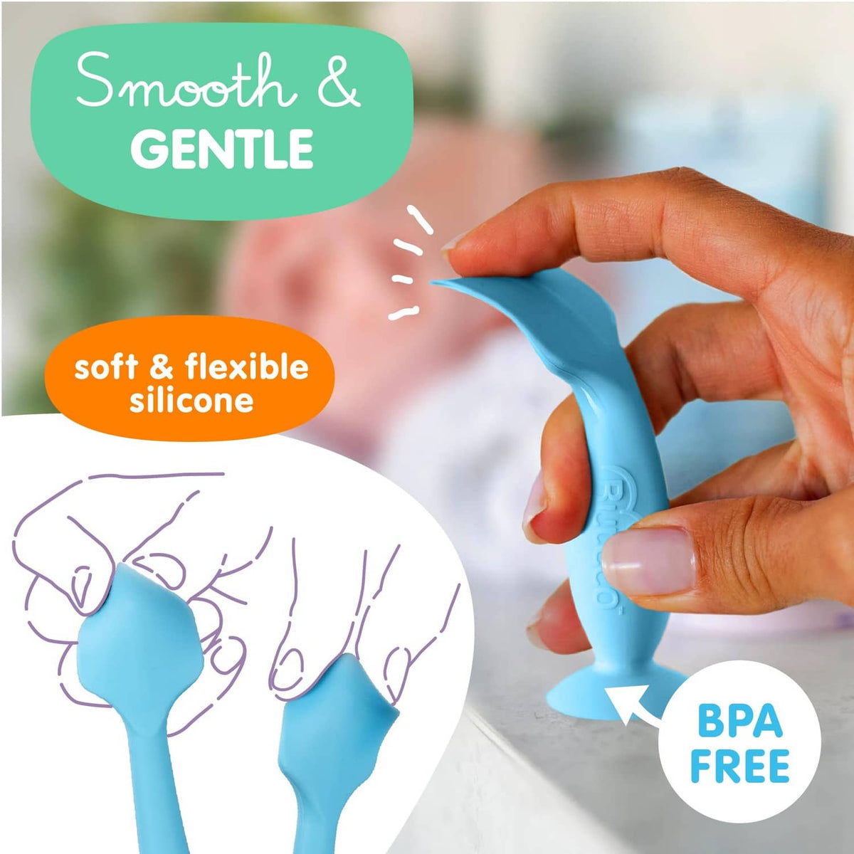 Blue flexible silicone baby bum brush with rounded head and suction base.