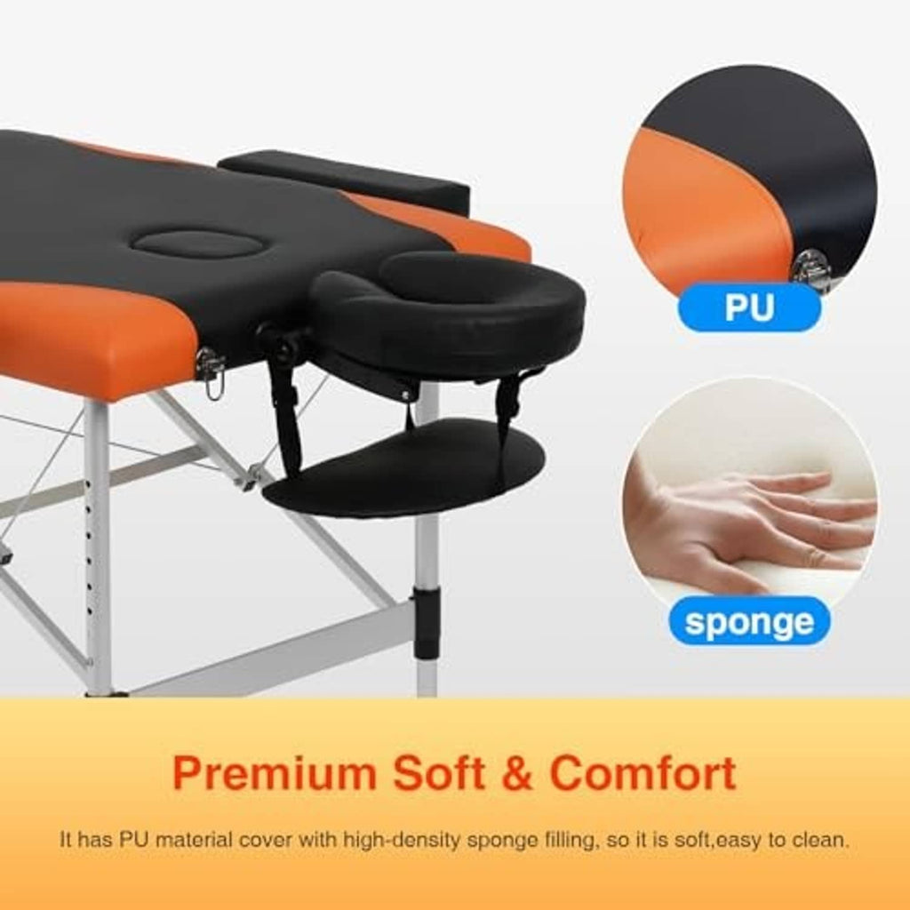 Orange and black massage table with padded headrest and armrest, black vinyl upholstery