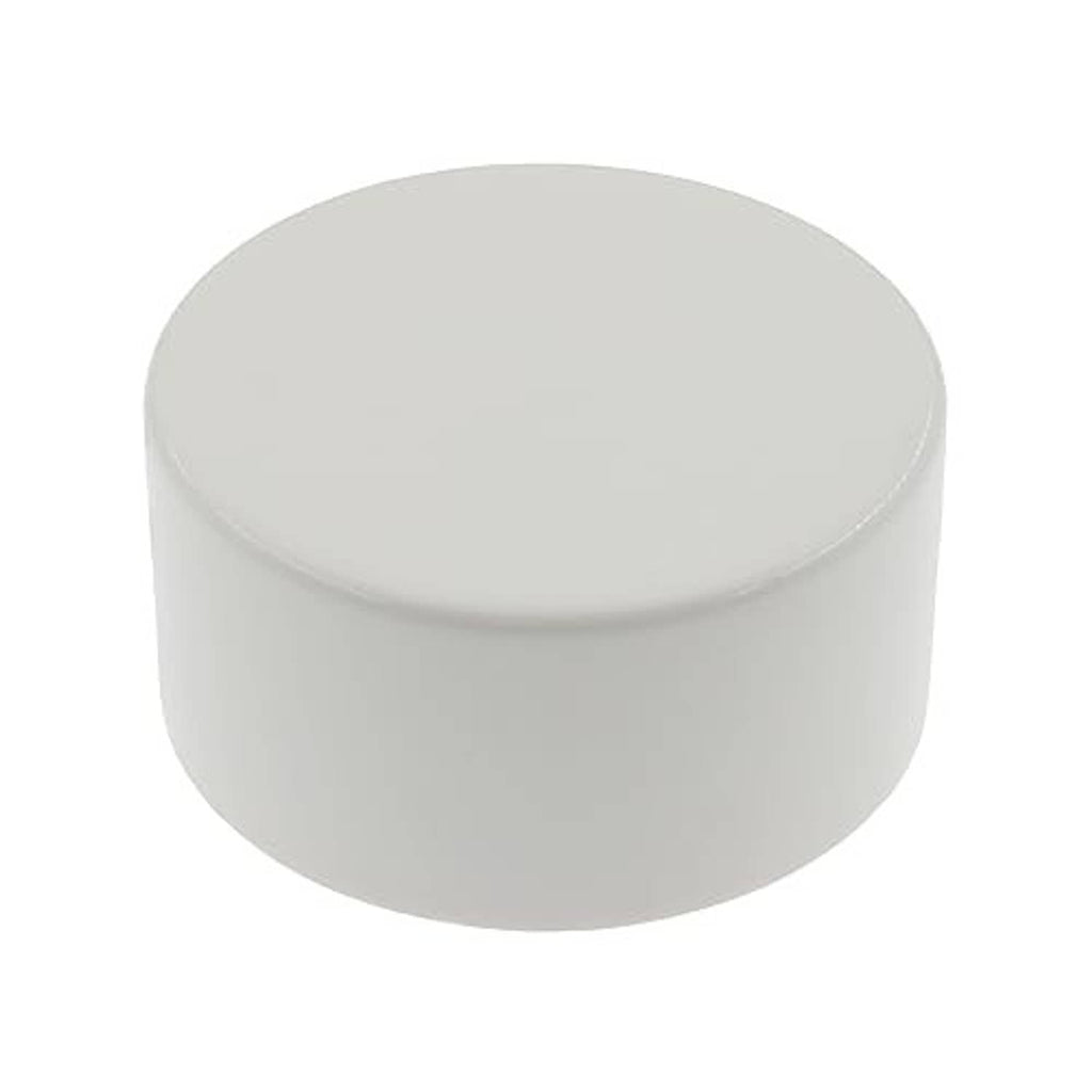 White PVC pipe end cap plug with smooth round top and short sidewall