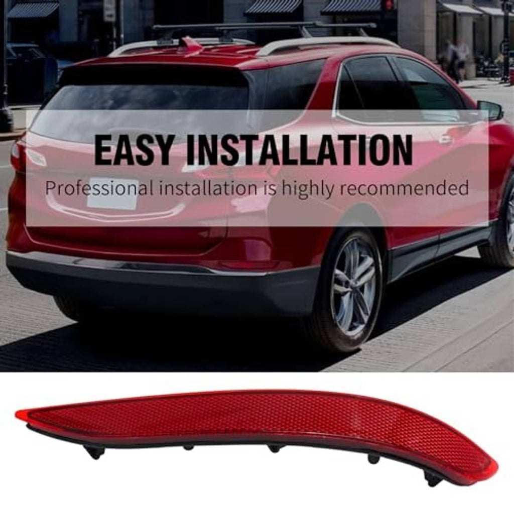 Red rear bumper reflector on a vehicle bumper, with black mounting tabs