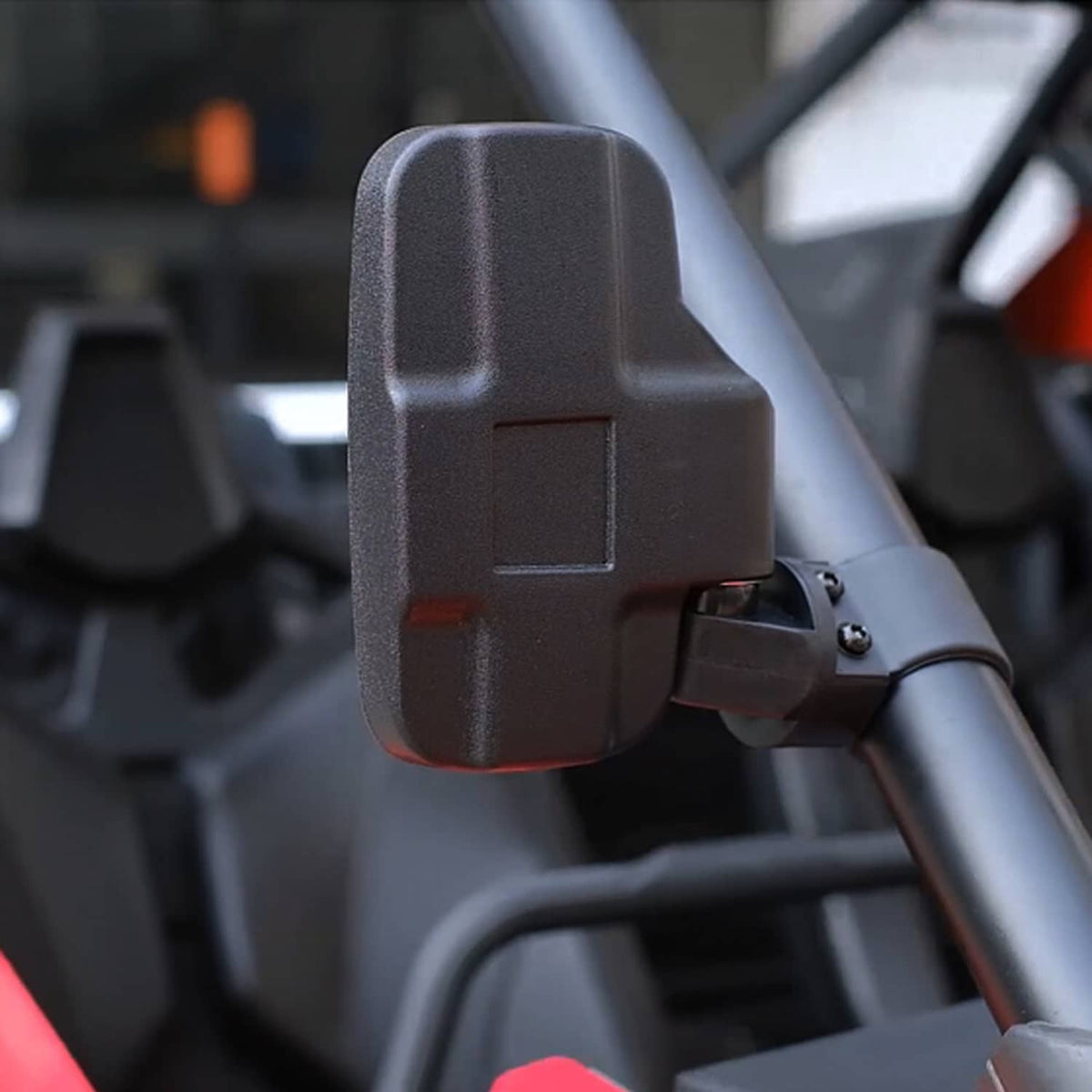 UTV side mirror head with protective housing on a vehicle roll cage