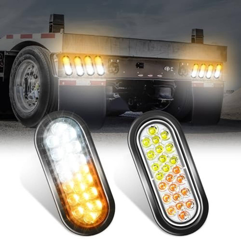 Oval LED strobe trailer lights, amber and white LEDs in recessed black housings, front view
