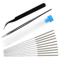 Nozzle cleaning kit with black tweezer tool, 0.4 mm needles, and clear storage tube