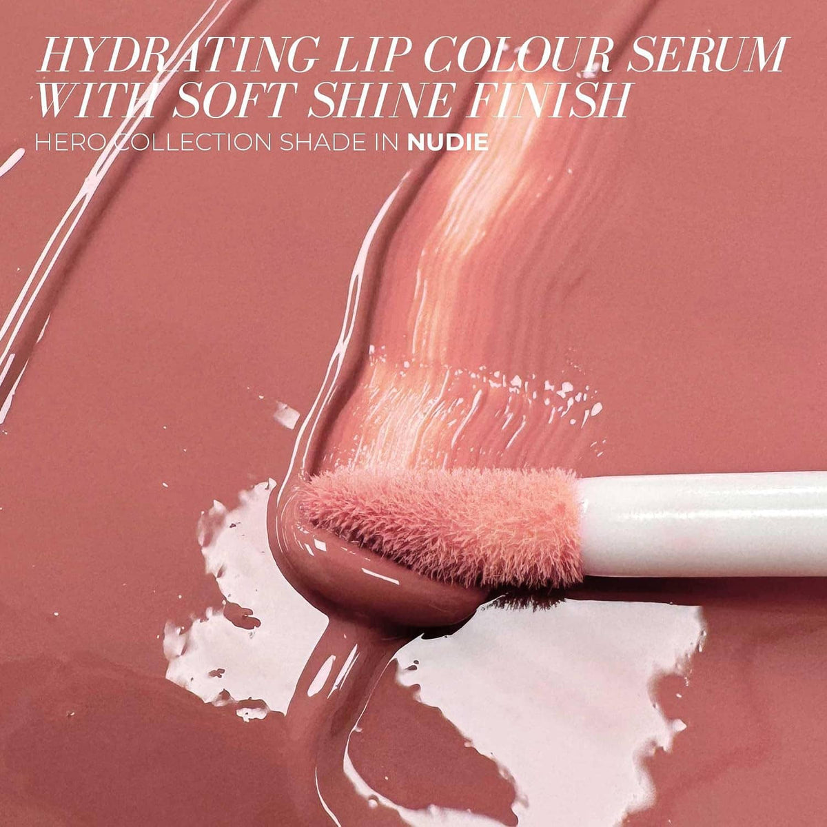 Nude rose lip gloss serum applicator spreading glossy gel on skin