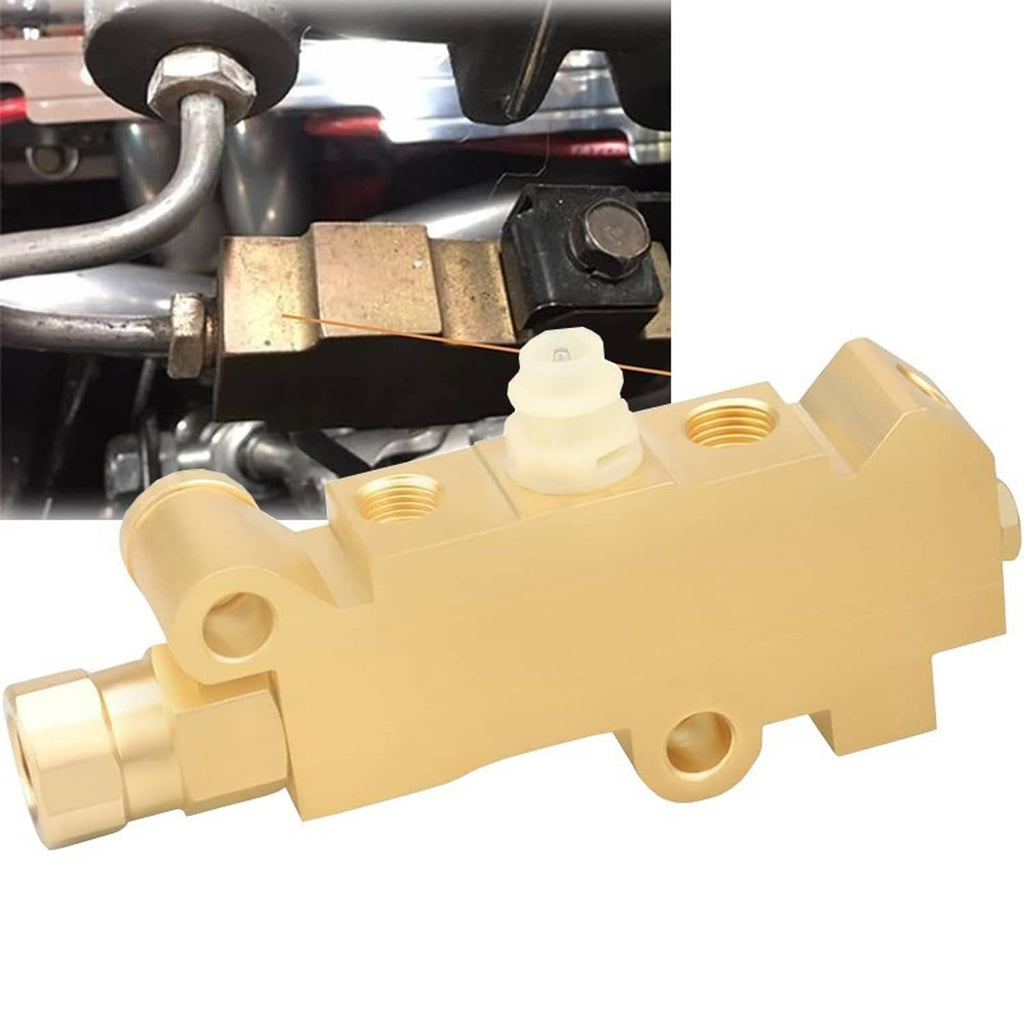 Brass brake proportioning valve installed with visible metal lines and fittings
