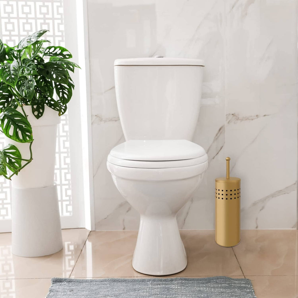 Gold toilet plunger holder with white toilet, freestanding on the floor