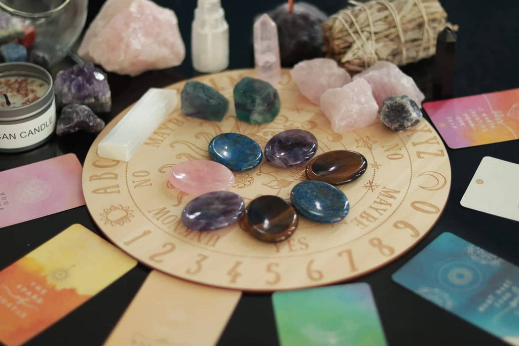Polished worry stones assortment with blue, purple, and brown ovals on display