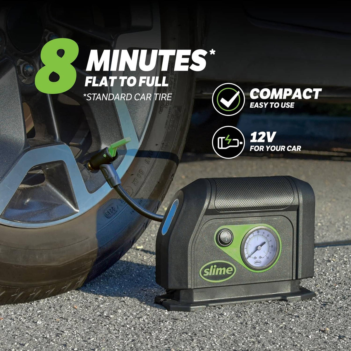 Portable tire inflator with analog gauge and attached hose, shown near a car tire