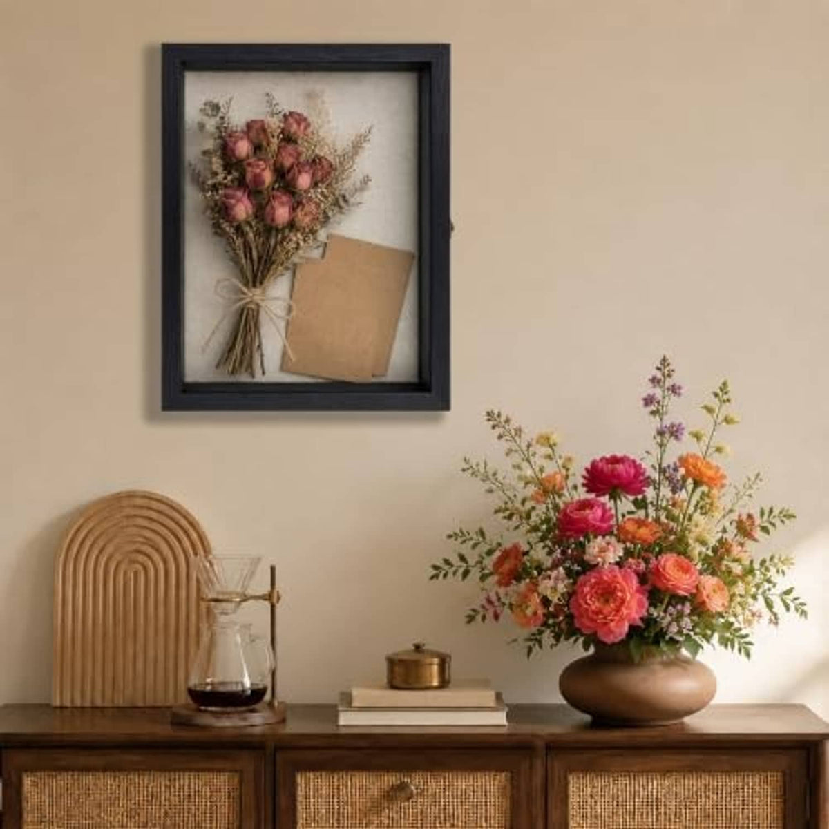 Black pine wood shadow box frame with pink floral bouquet and tied bundle inside