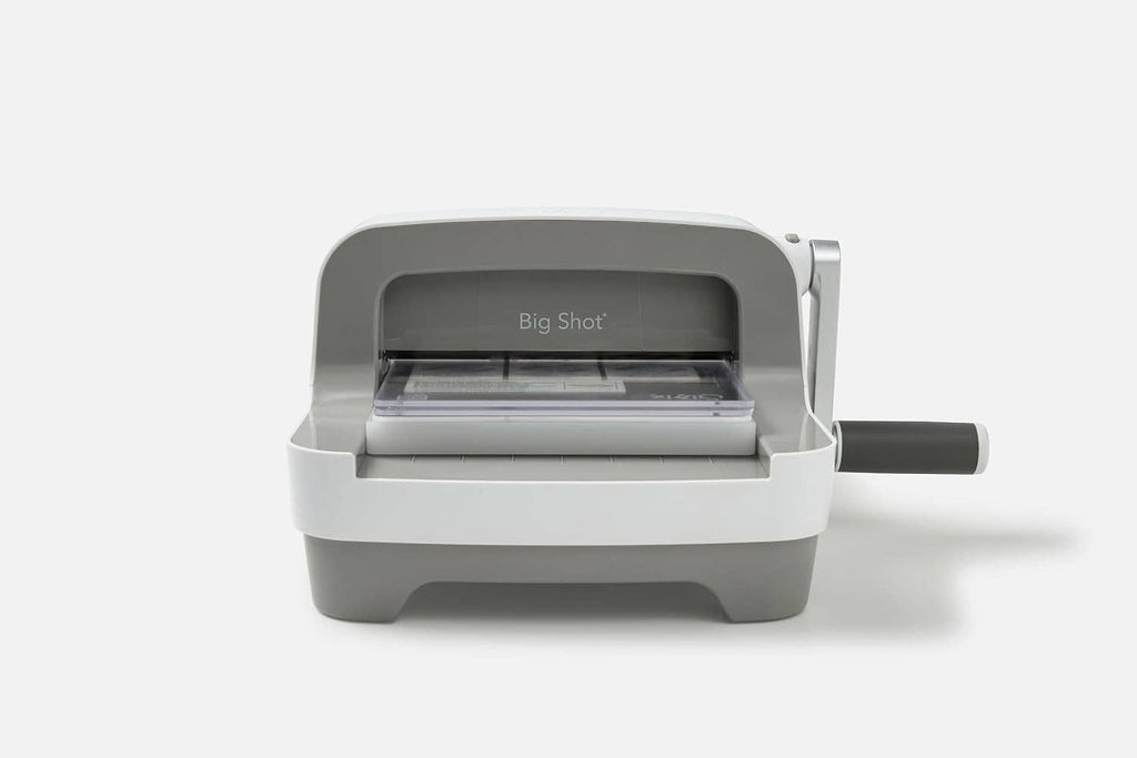White Sizzix Big Shot die-cutting machine shown front view with handle
