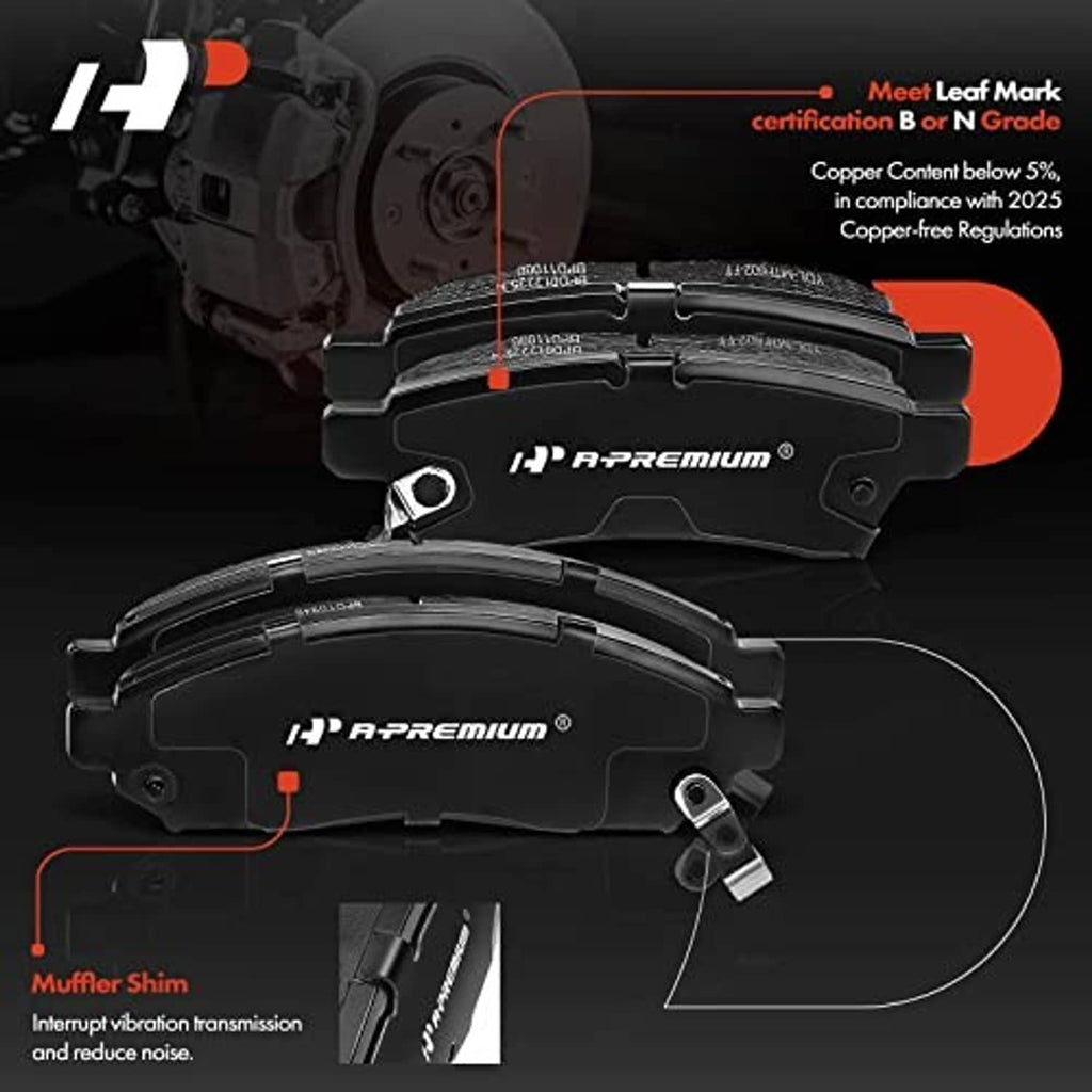 Front ceramic brake pads with two pad segments and mounting hardware on a dark background