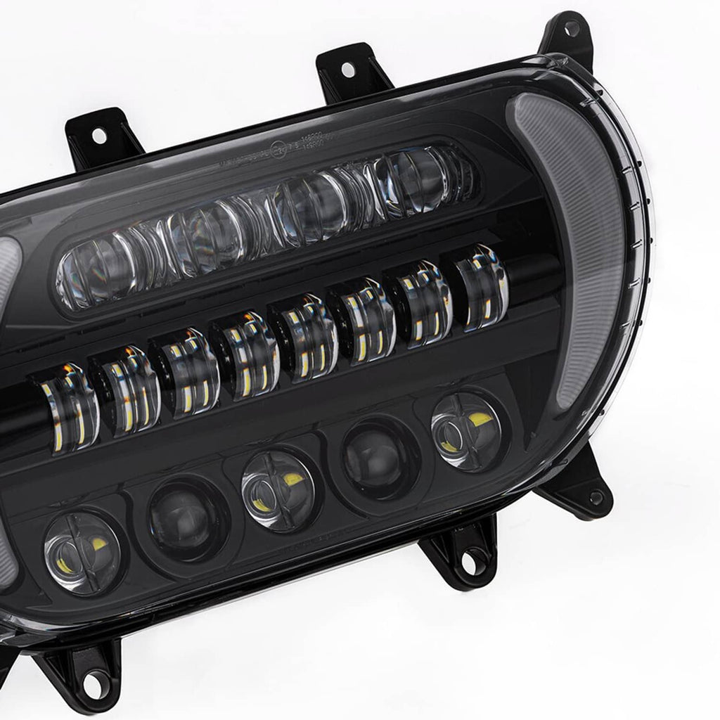 Black LED headlight housing with long projector lens and multi-row LED strip details