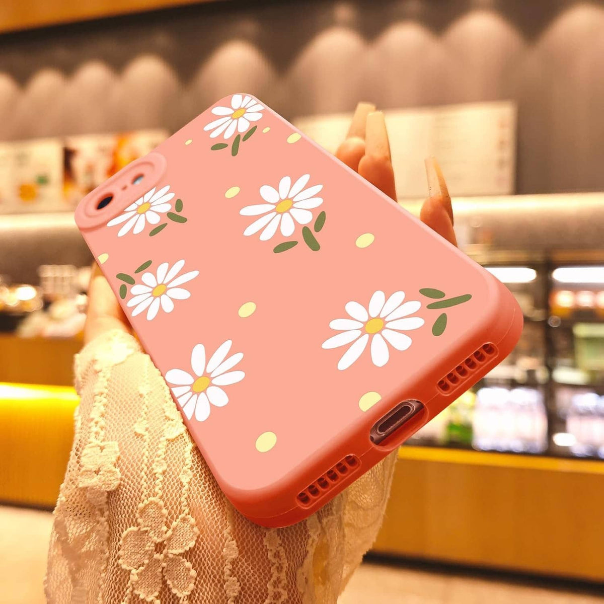 Pink iPhone SE/8/7 phone case with daisy and small dot pattern