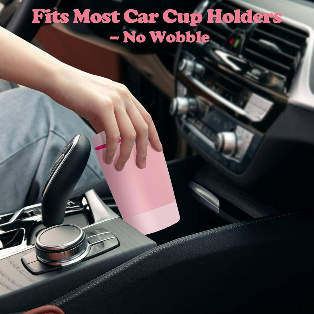 Pink silicone tumbler boot sleeve in car cup holder