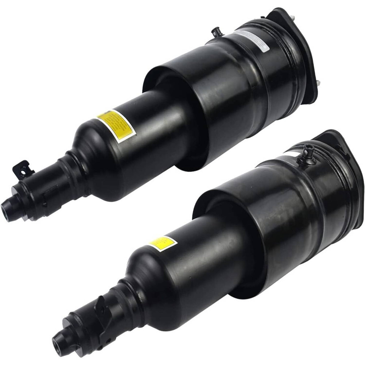 Air suspension shock strut pair with black finish and yellow warning label