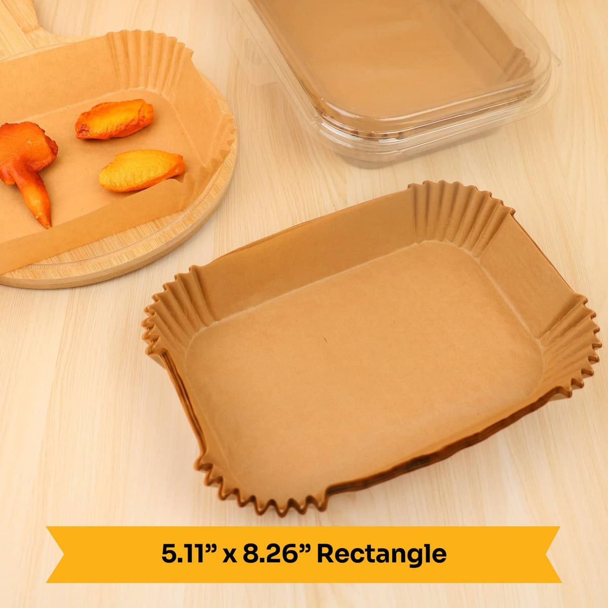 Tan rectangle air fryer paper liner tray with scalloped edges, open liner