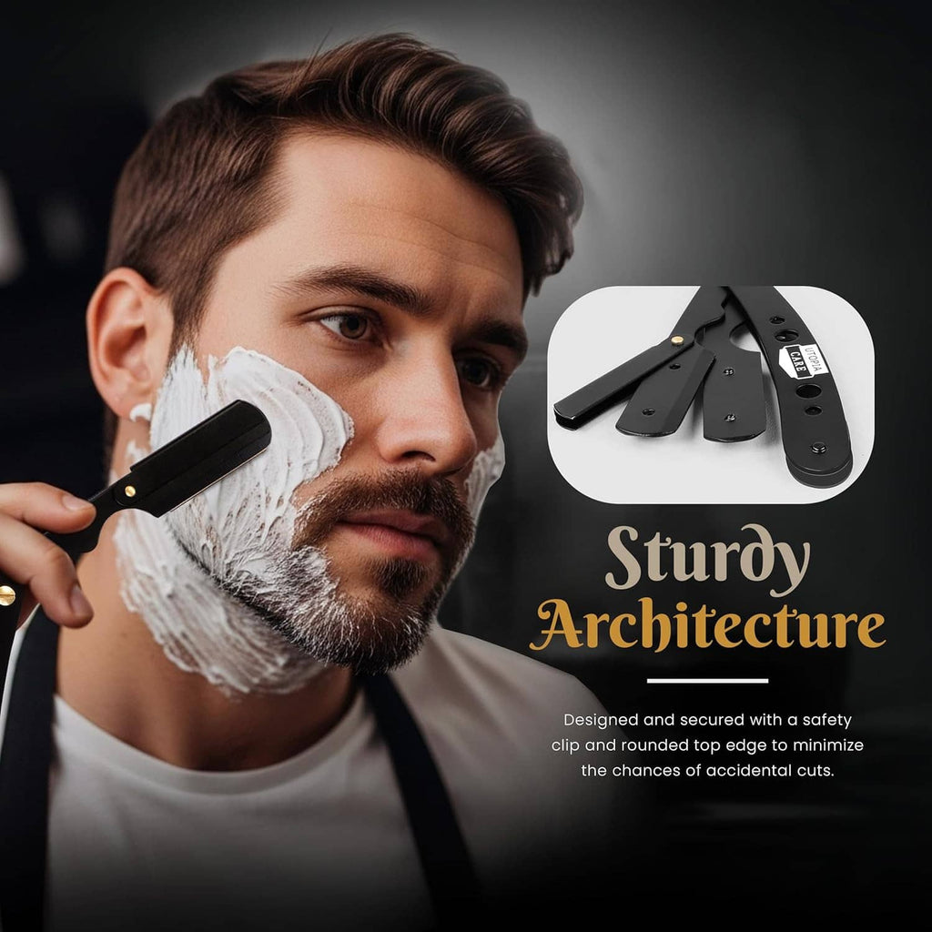 Men's black straight razor with safety clip, held near shaving foam on face.
