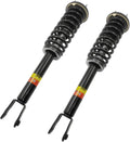 Pair of front electric shock struts with black coil springs and mounting forks