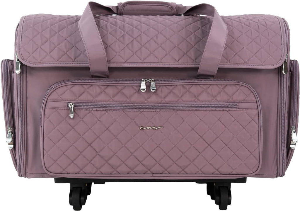 Purple quilted rolling craft bag with front zip compartment, padded handle straps and 4 caster wheels