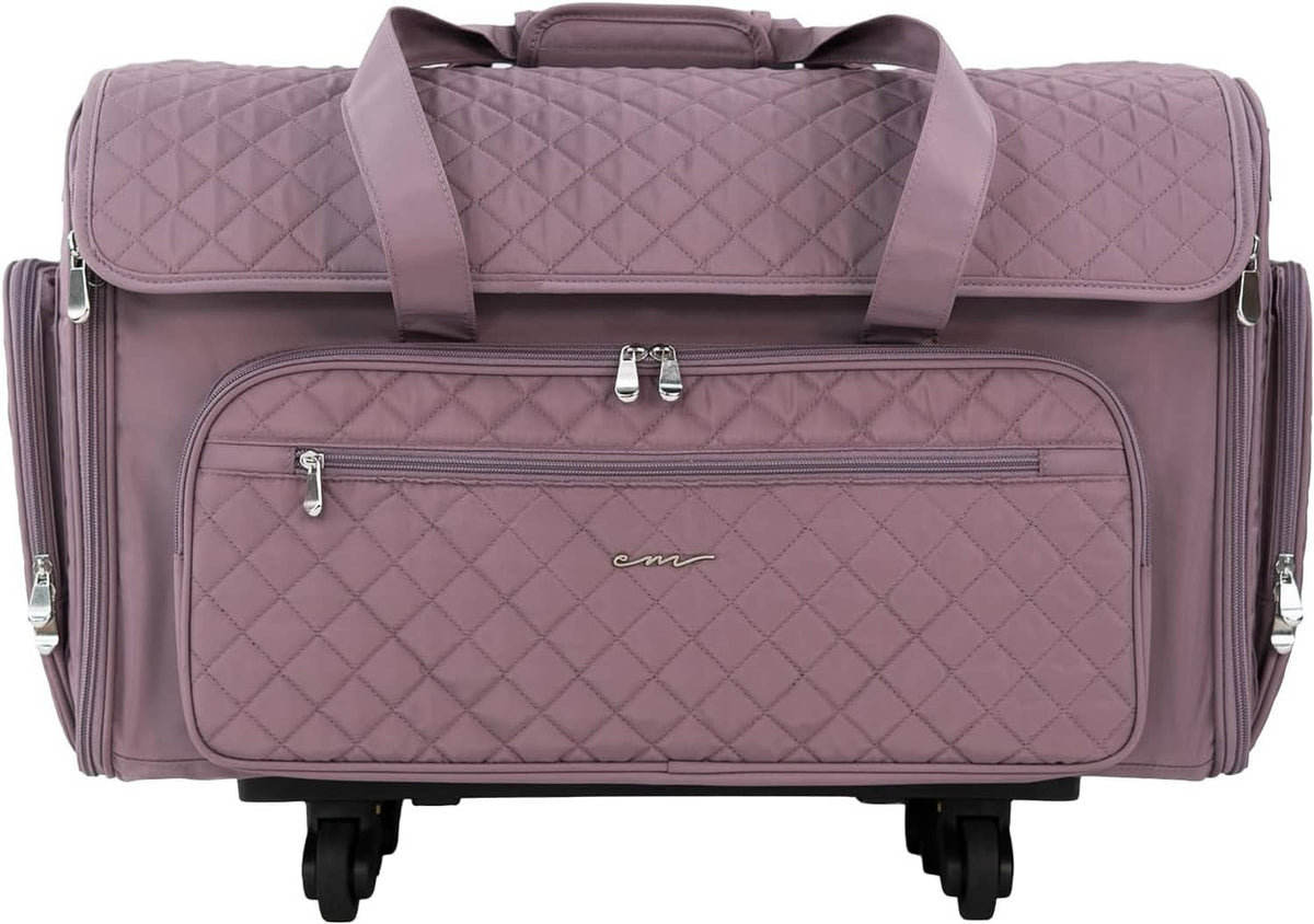Purple quilted rolling craft bag with front zip compartment, padded handle straps and 4 caster wheels