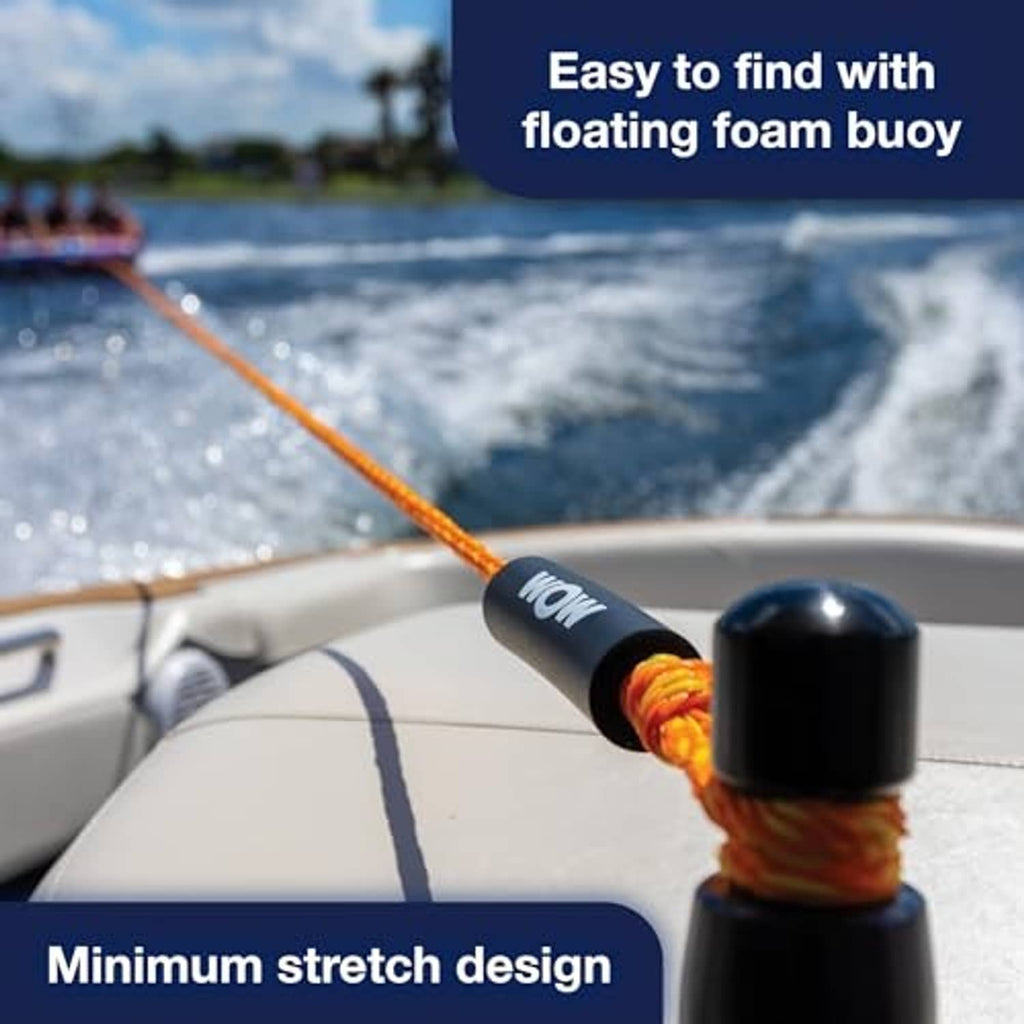 Orange tow rope with black floating foam buoy and coiled line on a boat