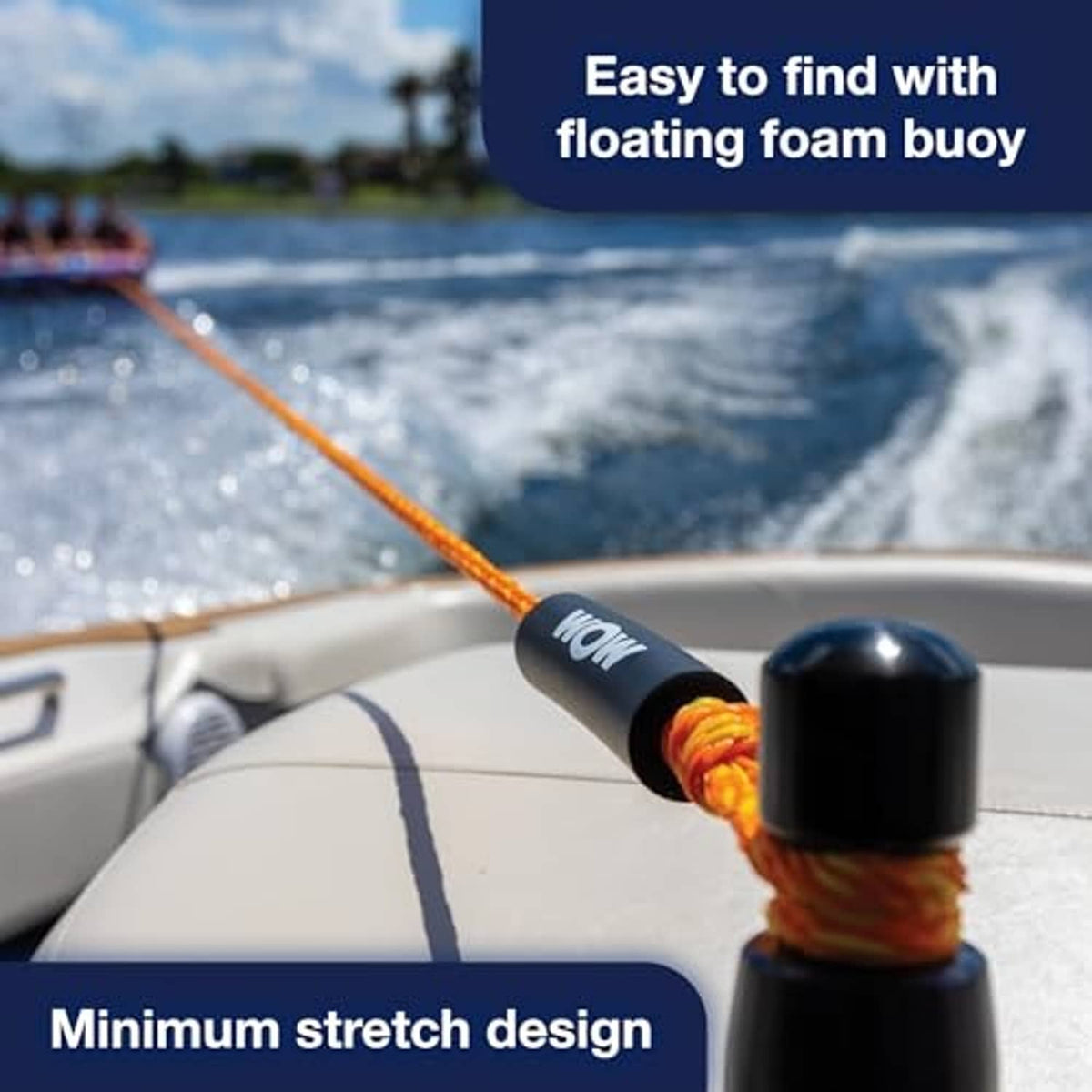 Orange tow rope with black floating foam buoy and coiled line on a boat