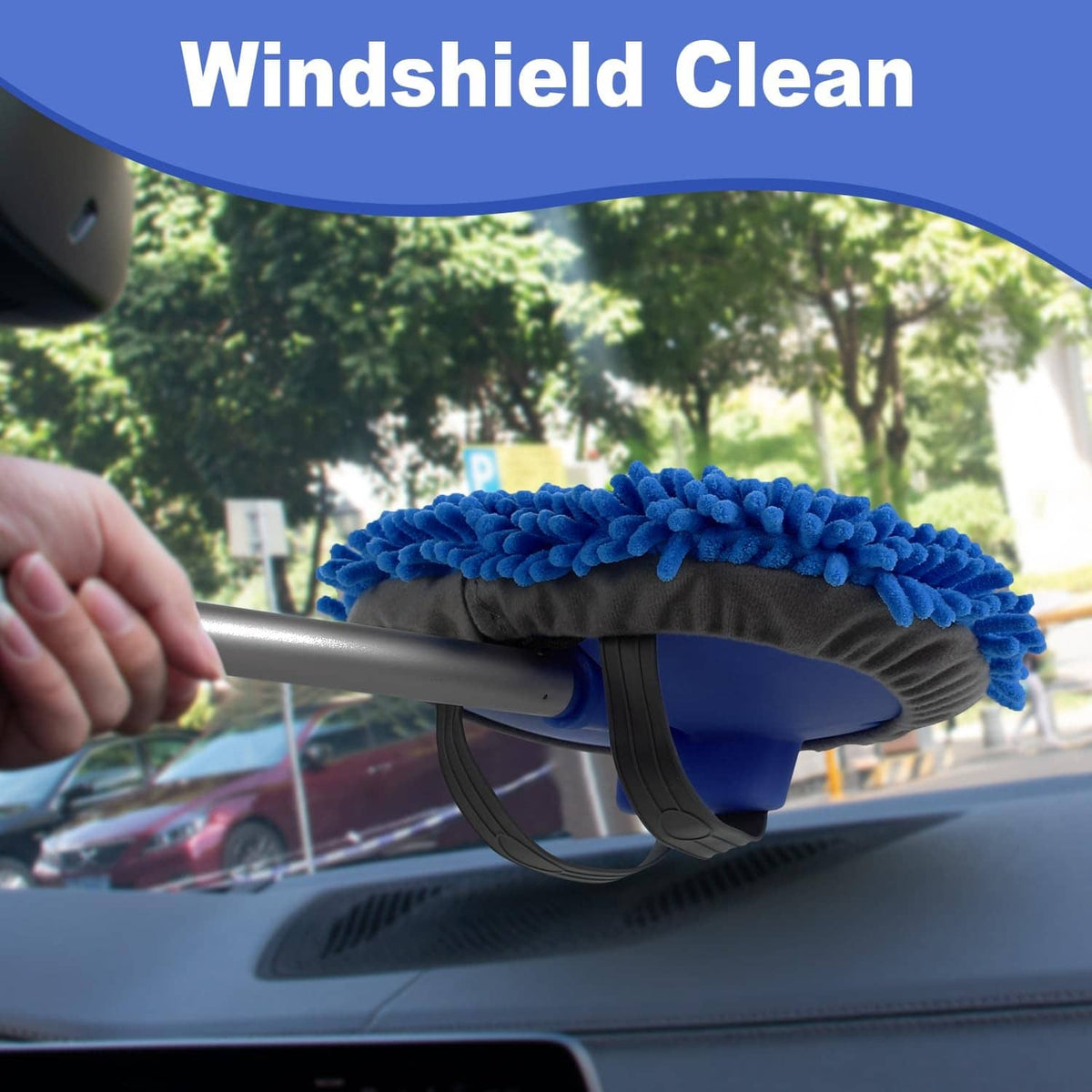 Blue microfiber car wash brush cleaning a car windshield
