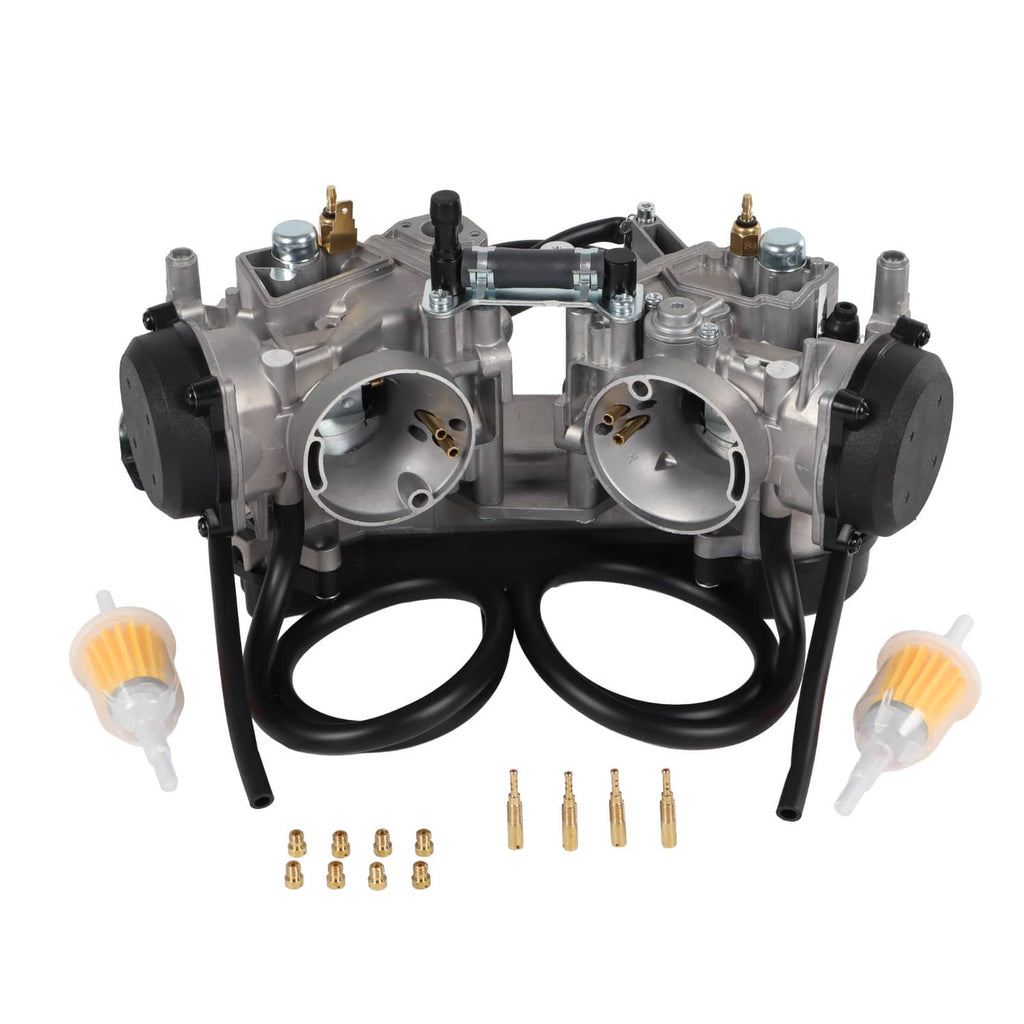 Dual carburetor assembly with two throttle bodies and connected black hoses