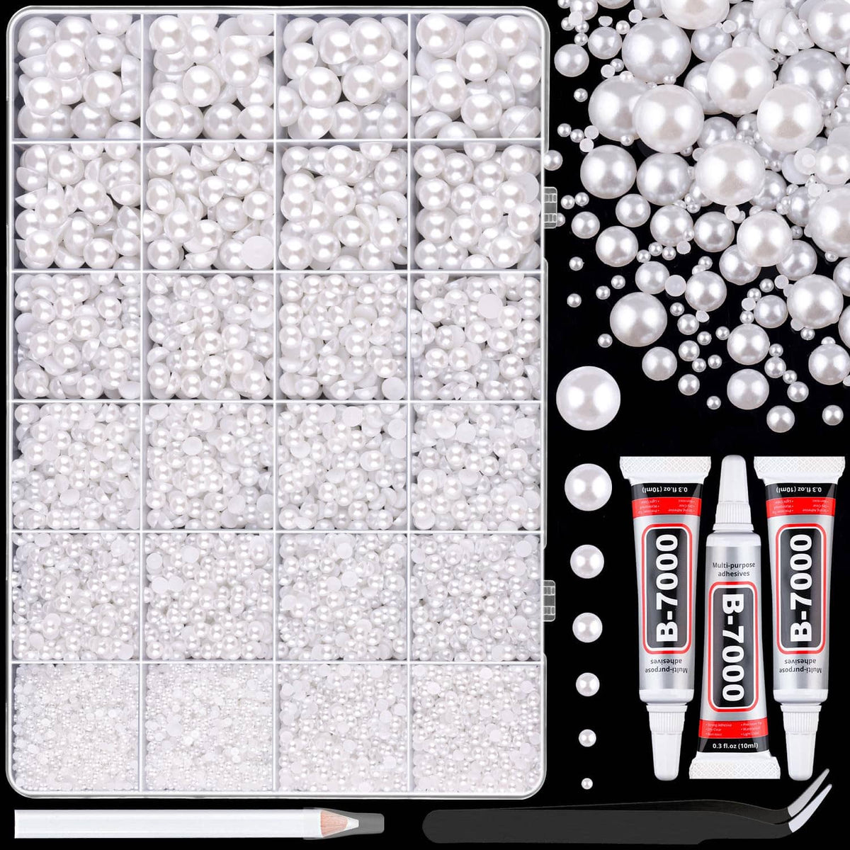 White flatback pearls assortment in clear tray compartments, plus loose pearls to the right