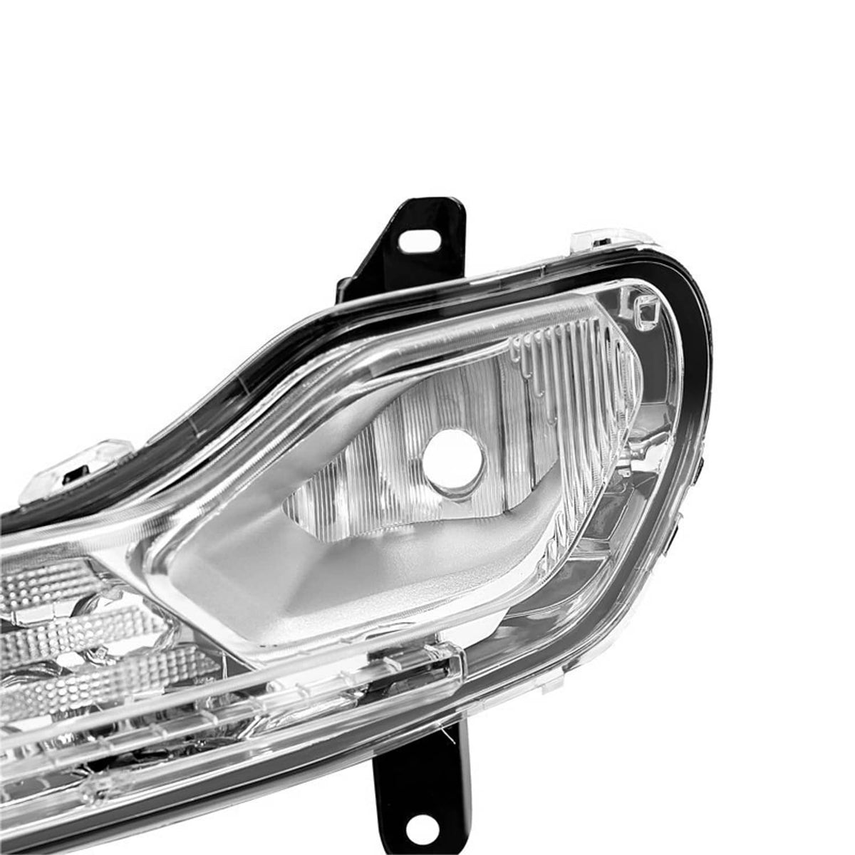Driver-side LH fog light lamp close-up, clear lens and chrome reflector details