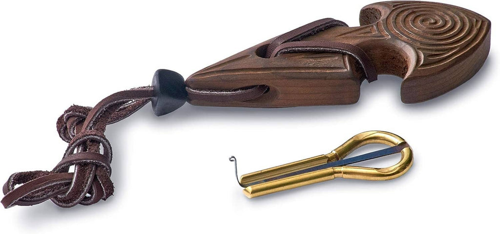 Dark wooden jaw harp case with engraved lid and separate brass mouthpiece
