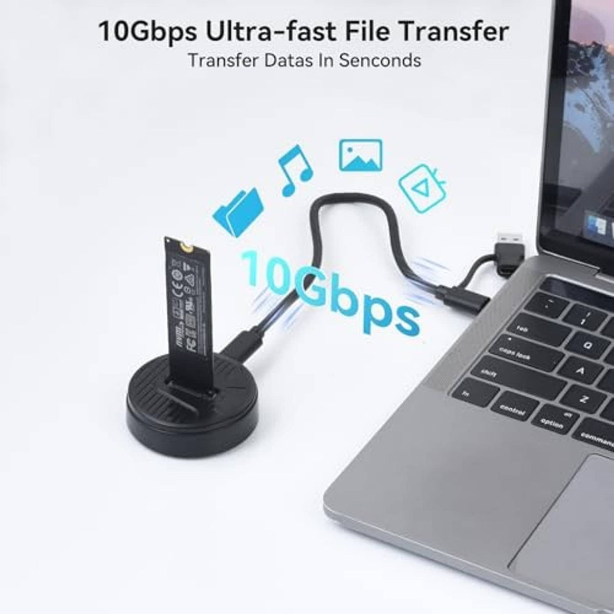 M.2 NVMe to USB adapter dock with connected cable near laptop