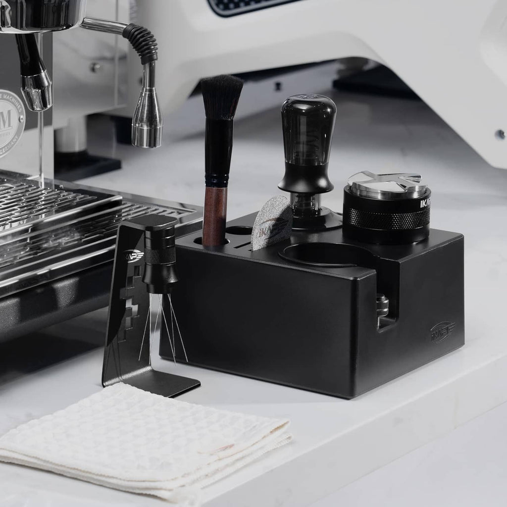 Black espresso tamper tool set tray with tamping station, brush, and cleaning cloth