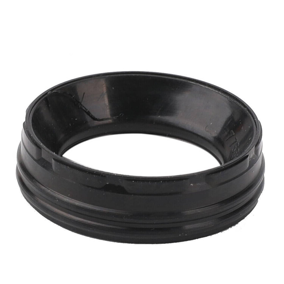 Black round valve cover gasket seal ring, side view with layered ridges.