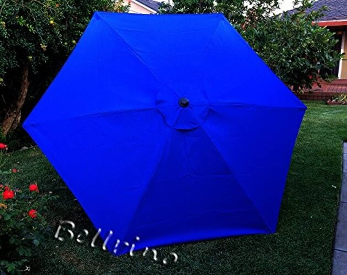 Royal blue patio umbrella replacement canopy open, showing dark center knob and rib lines