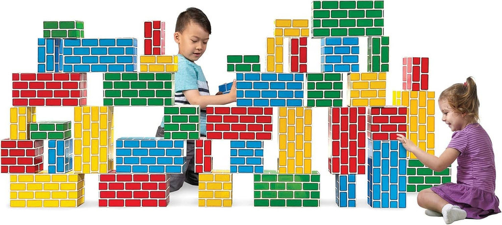 Children playing with colorful cardboard brick building blocks and towers