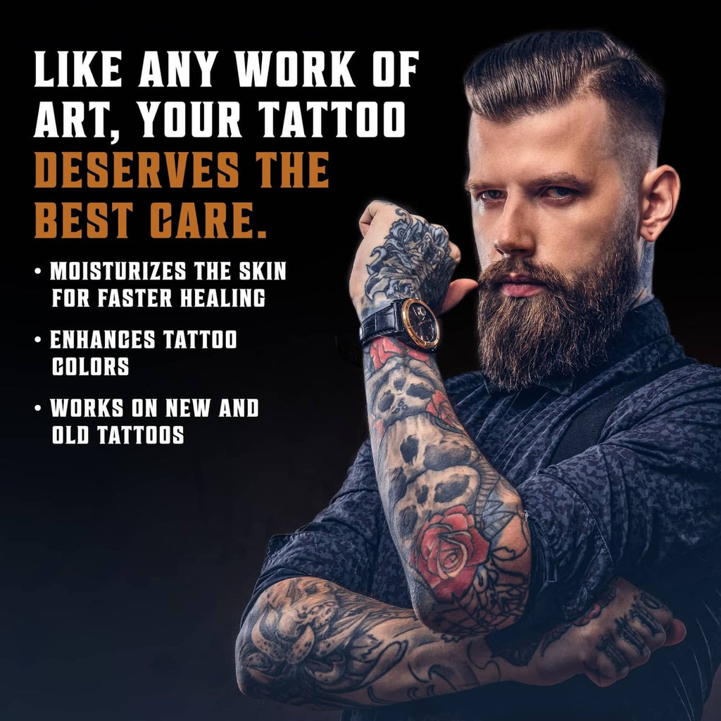 Viking Revolution tattoo care balm applied to forearm, gloved hands on tattooed skin