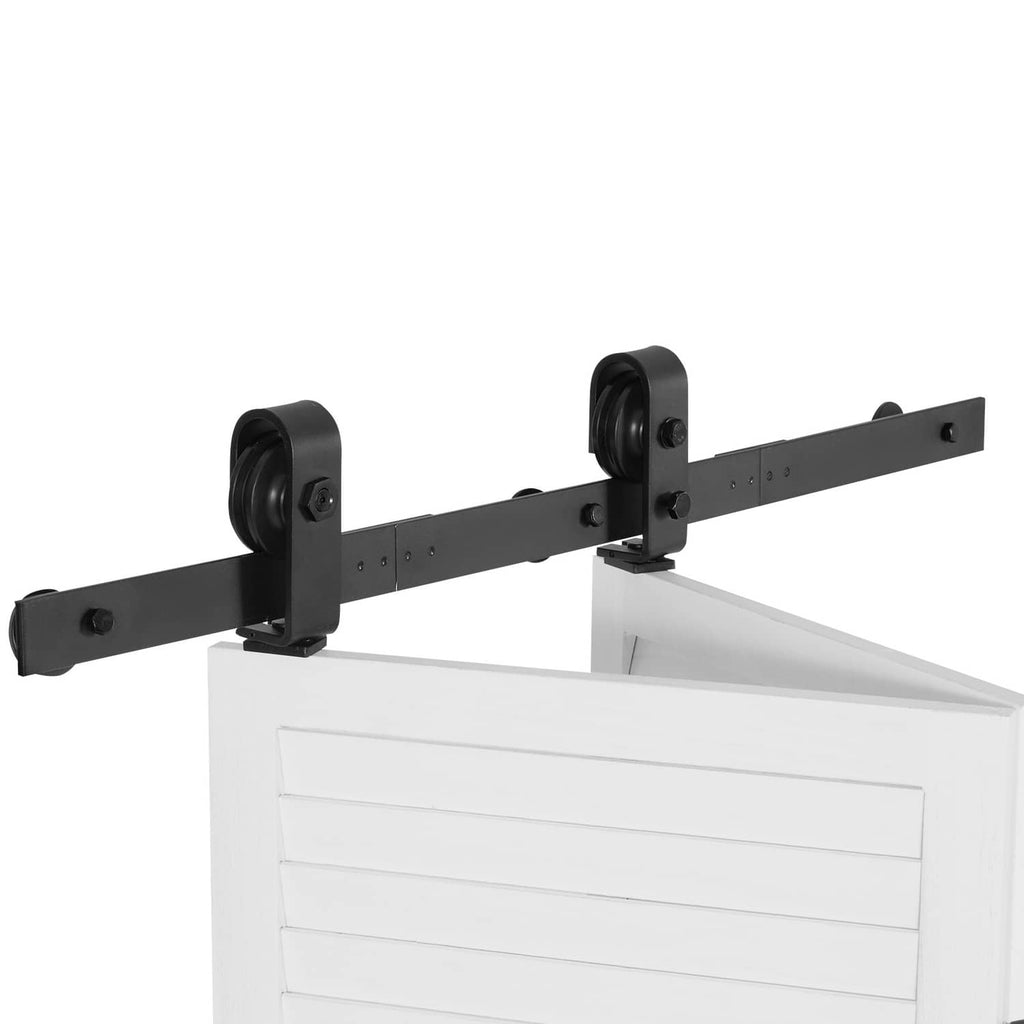Barn door hardware track kit with black rail, rollers, and mounting brackets on door